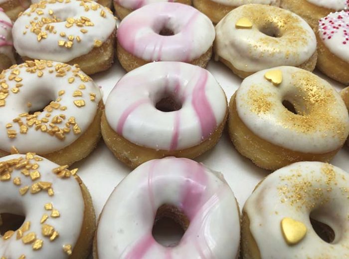 Gold to Pink Mini Donut box closeup - JJ Donuts